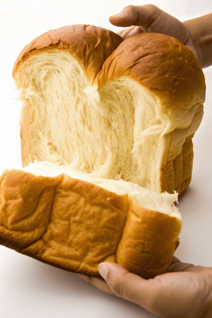 The Ultimate Guide to the Japanese Egg Sandwich – Why It’s Taking Over the World 3 Close-up of soft shokupan Japanese milk bread being sliced